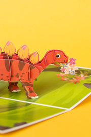 DINOZAURIUKO SVEIKINIMAI: išskirtinio grožio 3D pop - up atvirukas + vokas - OBUOLYS