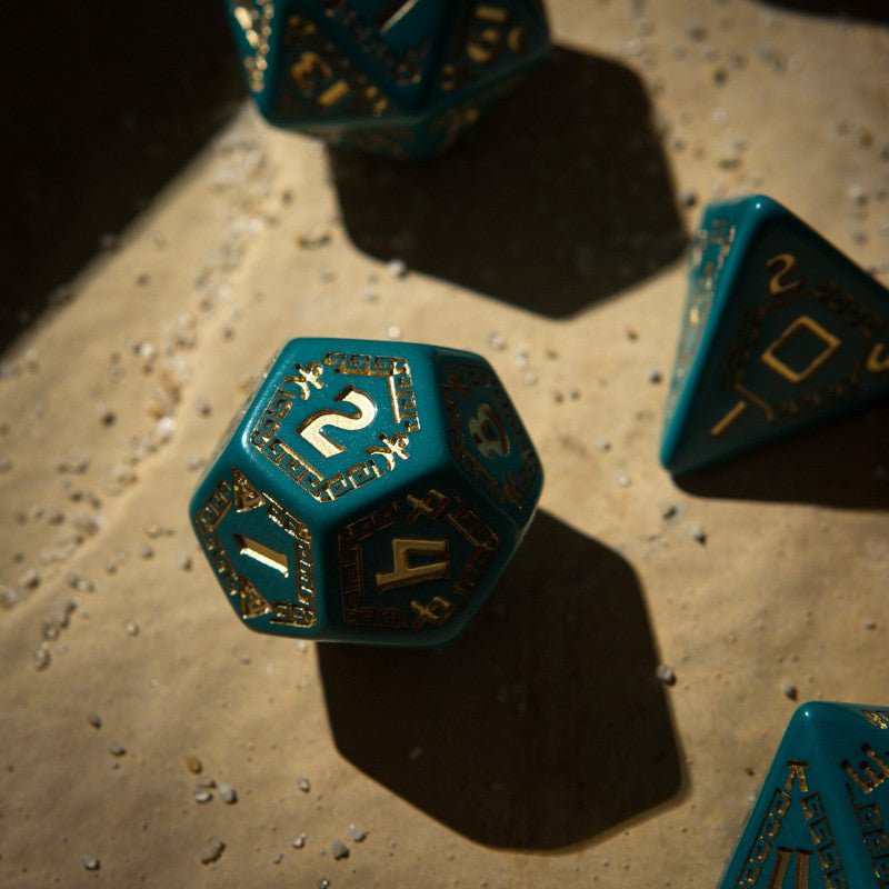 Runequest kauliukų rinkinys turkio ir auksinės spalvos - OBUOLYS