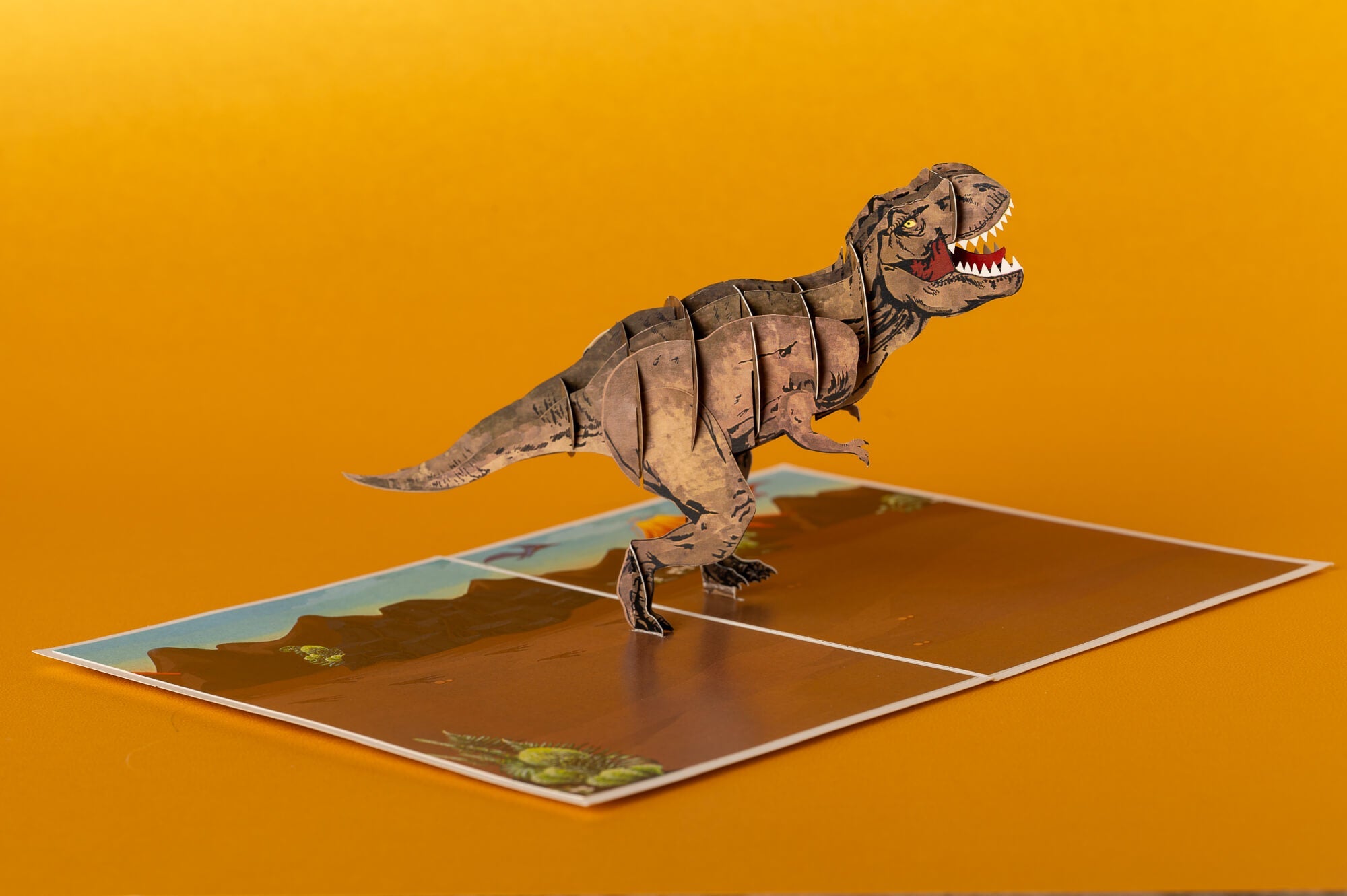 TIRANOZAURAS: išskirtinio grožio 3D pop - up atvirukas + vokas - OBUOLYS